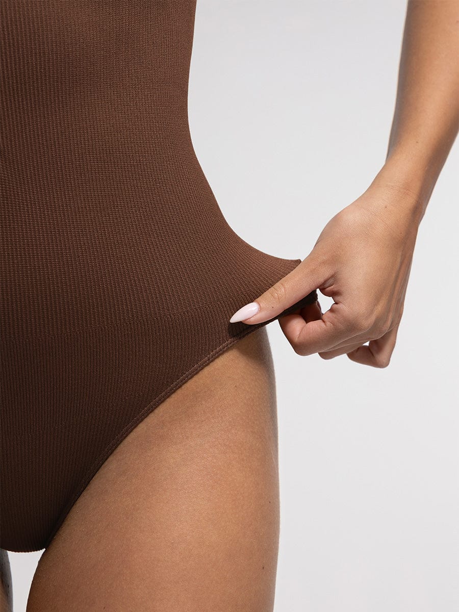 Wholesale Seamless Ribbed Zip Front Sleeveless Briefs Bodysuit.