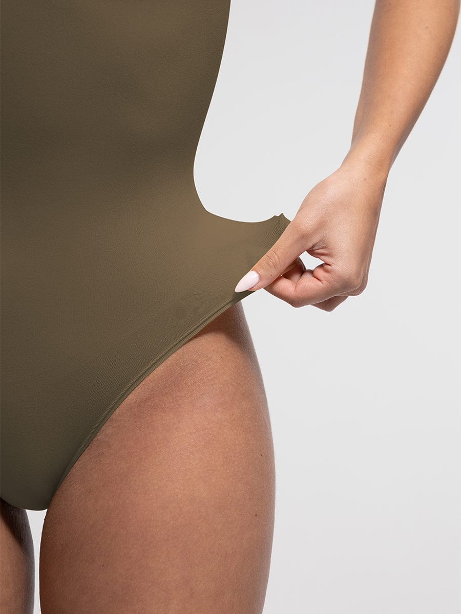 Wholesale Seamless Bust Support Waist and Abdomen Control Thong Bodysuit.